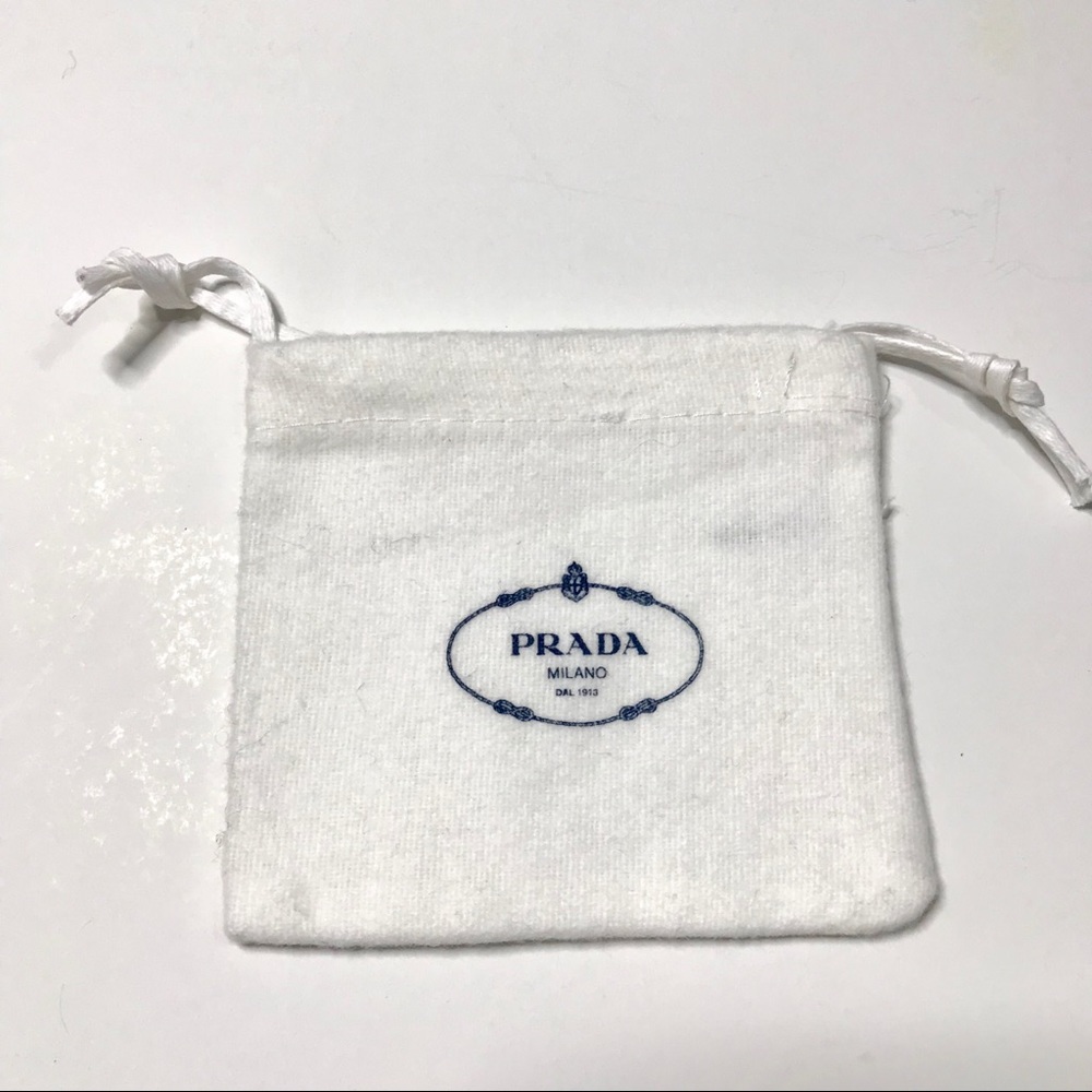 Prada bracelet white pouch dust bag.